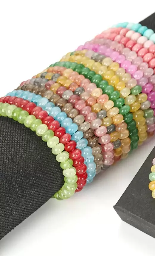 Wholesale Rainbow Crackle Quartz Bracelets — Colourful crackle quartz rondelle beads — a bright, low-cost impulse buy.
