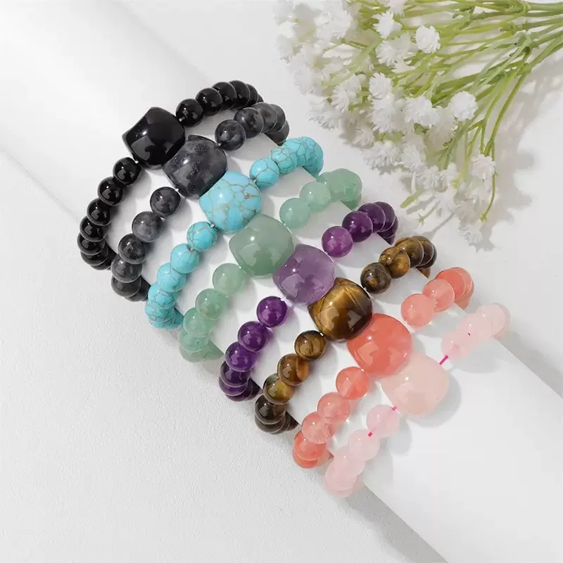 Wholesale Natural Stone Bracelets with Focal Bead — Round beads with a large statement centre stone — many stones available.