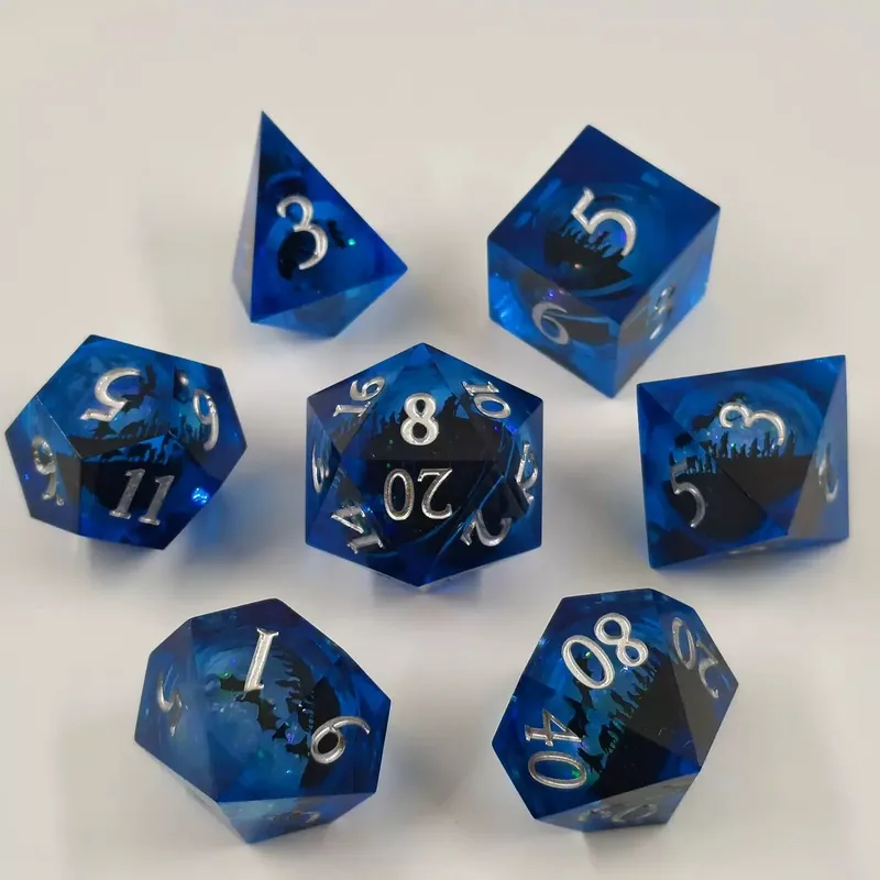 Wholesale Blue Dragon Resin Dice — Deep-blue sharp-edge resin with a dragon-and-mountain silhouette, silver ink.